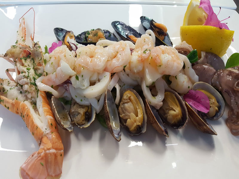 cucina tradizionale italiana Bergamo atipasto di pesce ristorante Latterraggio